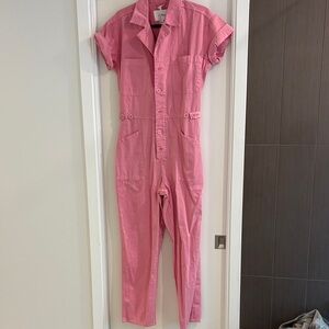 Pink pant suit pistola